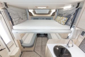 F60-bed-dinette-scaled.jpeg